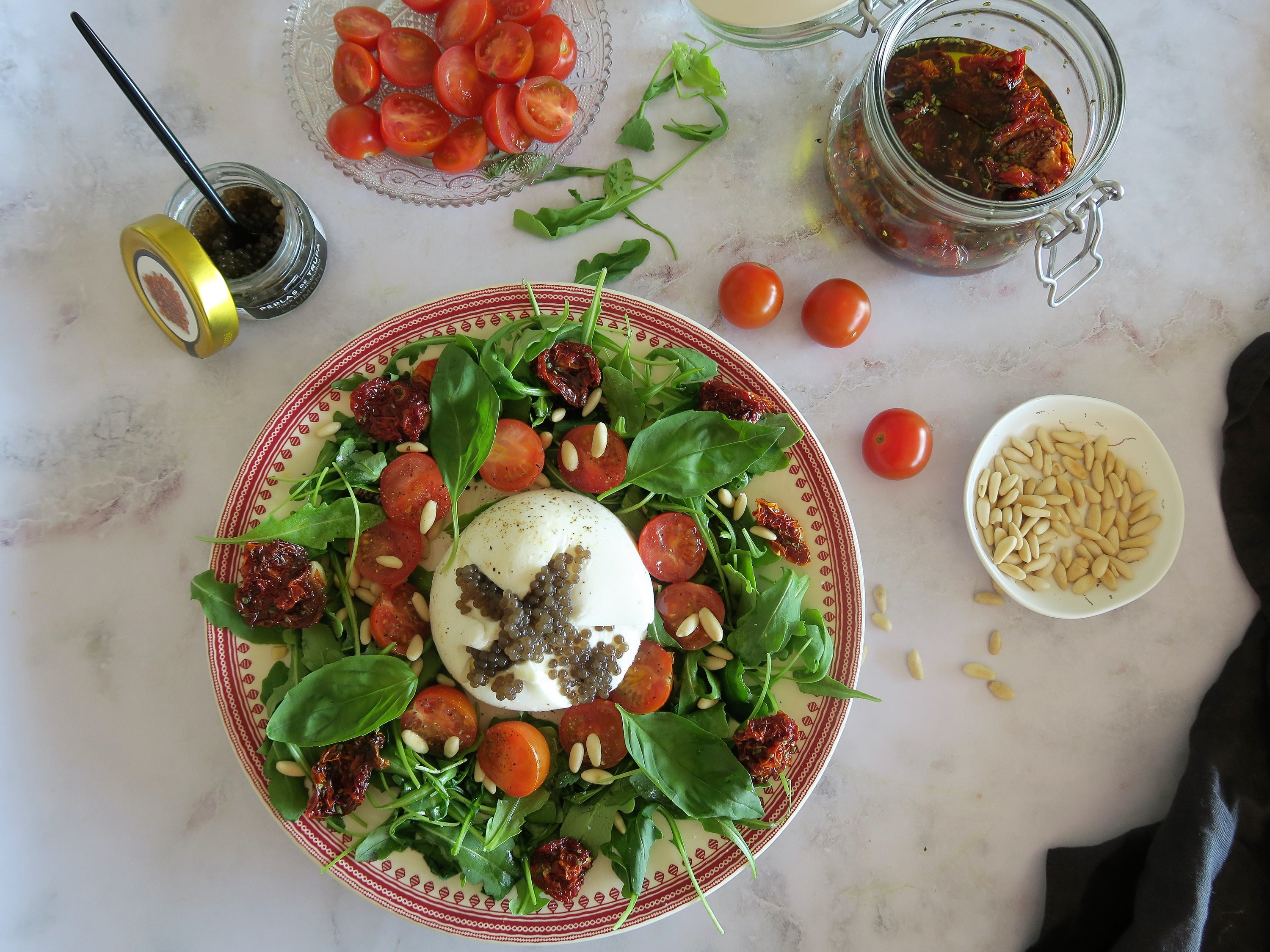 Burrata Salad with Pine Nuts and Black Truffle Pearls