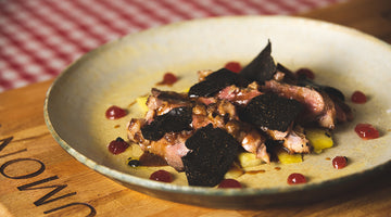 Duck magret with black truffle, pineapple, and strawberry jam